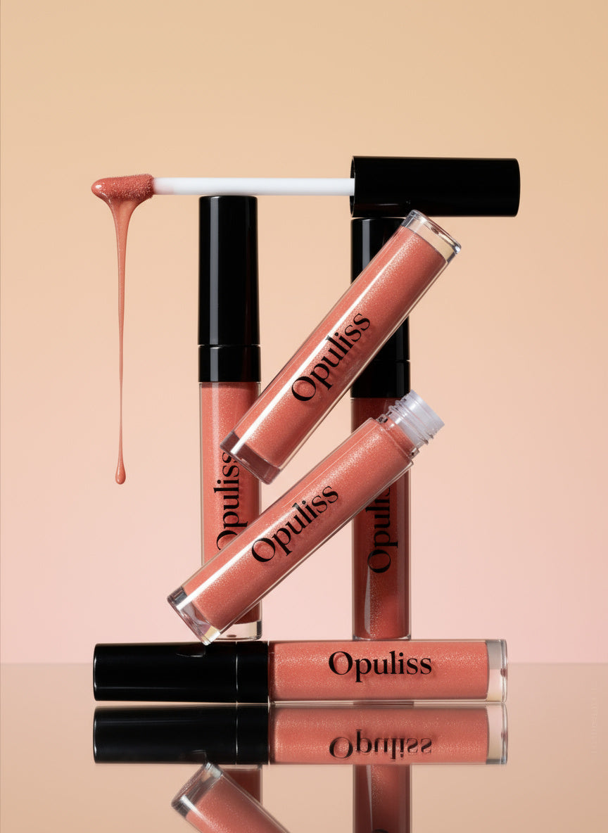 Opuliss lip oil bottles stacked with oil dripping from the wand