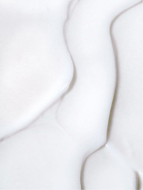 A ribbon of white cream on a pale ground, HIGH GLOSS CONDITIONER