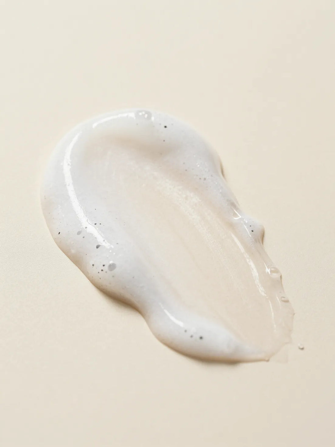 GINGER CARDAMOM BODY WASH, the texture of clear washing gel in close macro