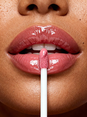 Lip Oil Hydrating Medium Coverage Volumizing Glow Makeup Enthusiasts applied to the lips