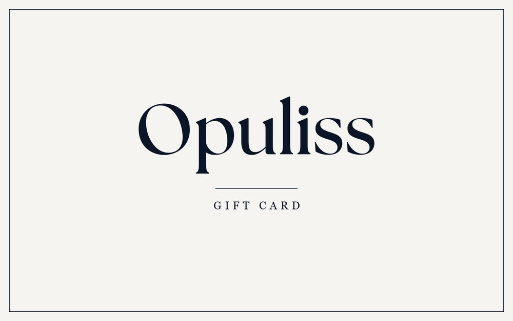 An Opuliss gift card, deep navy with the Opuliss wordmark in cream, above a thin rule reading GIFT CARD