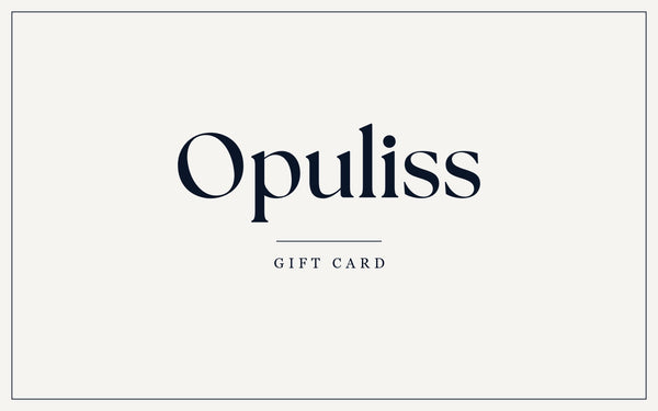 The reverse of the Opuliss gift card, the same face inverted, cream with the Opuliss wordmark in deep navy